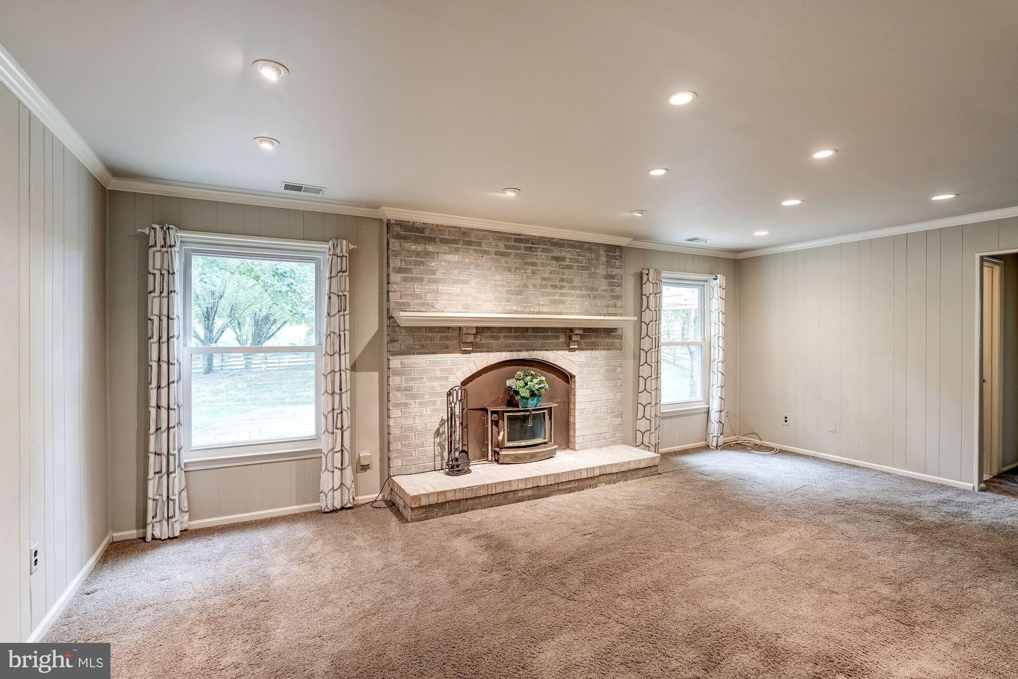 5 Clapham Court Sterling, VA 20165 - Photo 11 of 16 Family Rm off Kitchen w/ Wood Burning Stove Insert