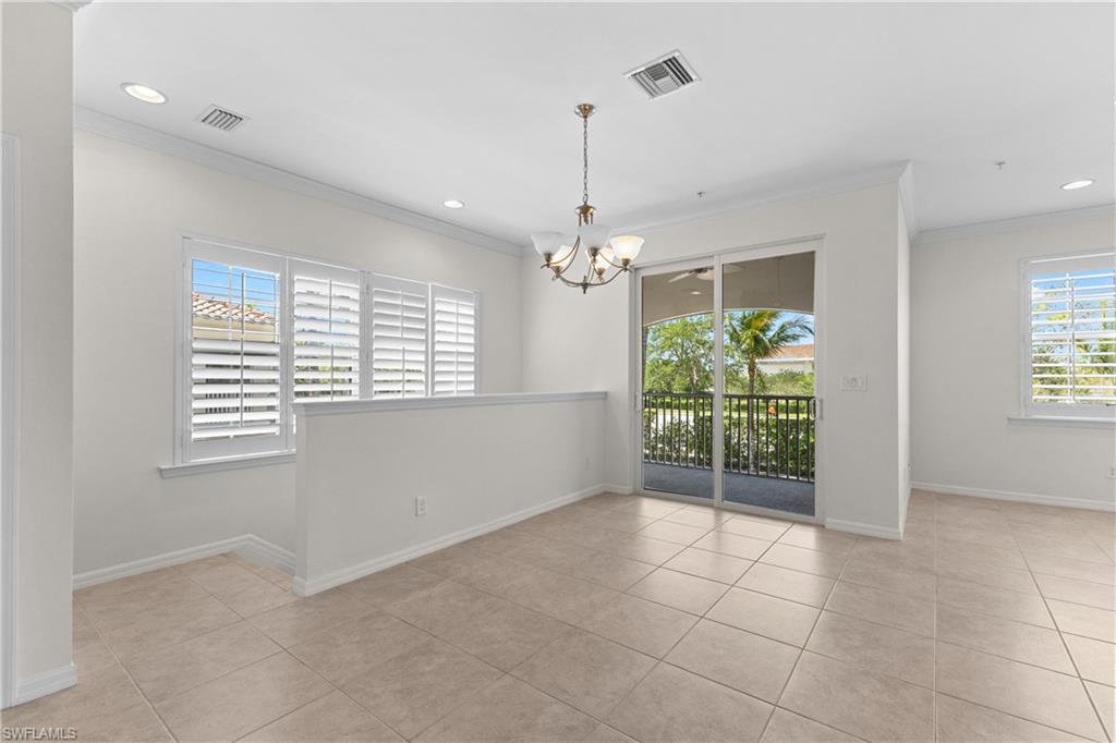 8531 Violeta Street, Unit 203 Estero, FL 34135 - Photo 13 of 35 a view of an empty room with a window