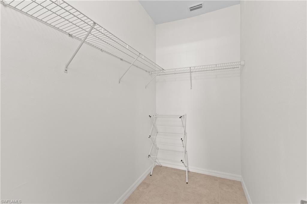 8531 Violeta Street, Unit 203 Estero, FL 34135 - Photo 16 of 35 a view of an empty walk in closet