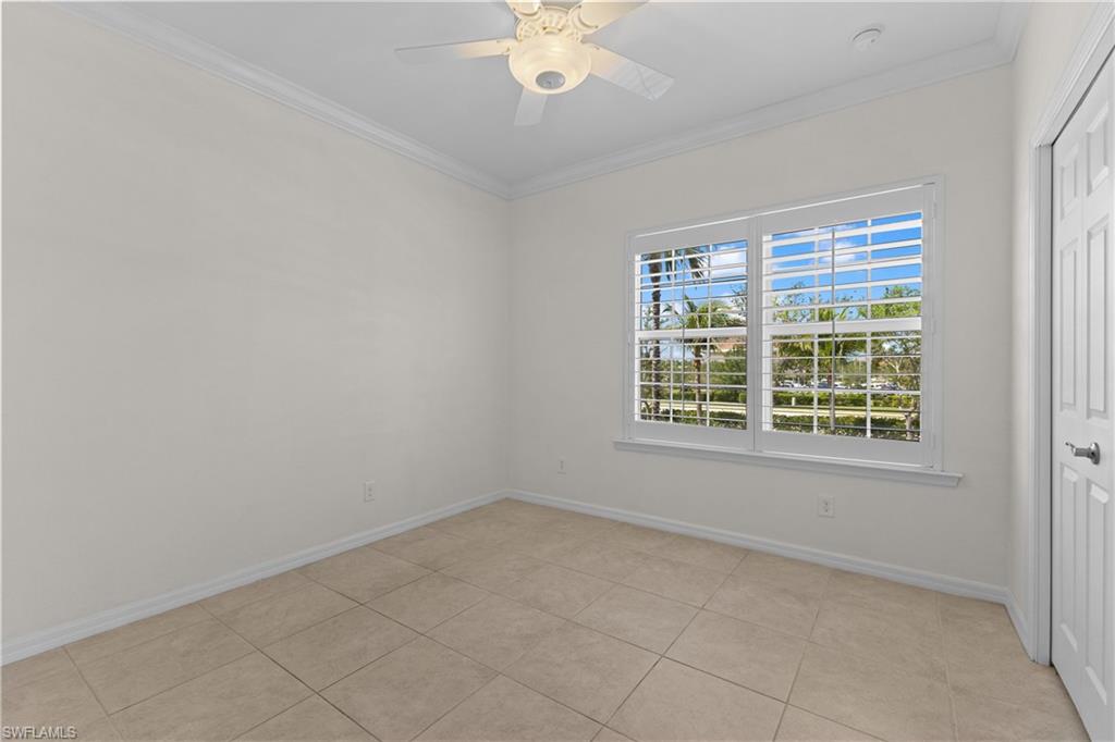 8531 Violeta Street, Unit 203 Estero, FL 34135 - Photo 20 of 35 a view of an empty room with a window
