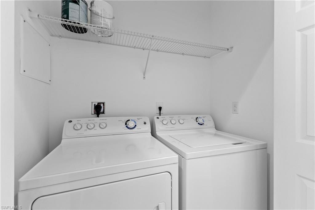 8531 Violeta Street, Unit 203 Estero, FL 34135 - Photo 22 of 35 a utility room with dryer and washer