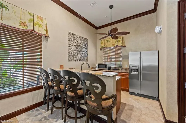 a room with wooden floor and furniture