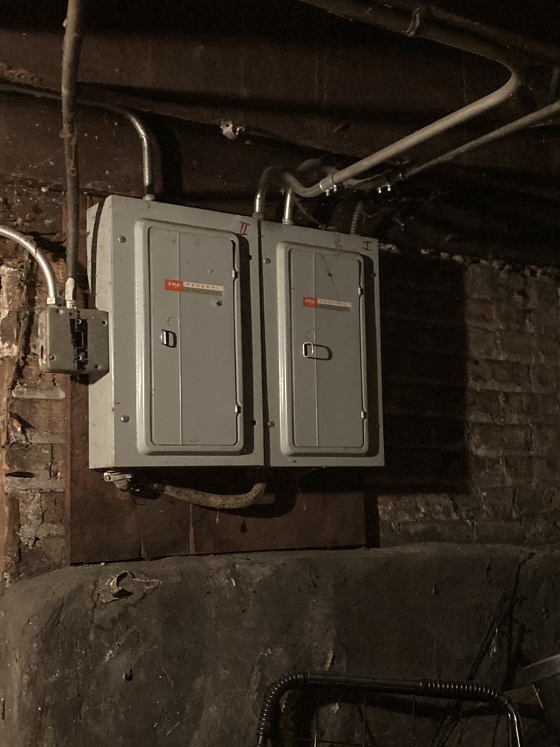 910 West 32nd Place Chicago, IL 60608 - Photo 25 of 28 a view of water heater room