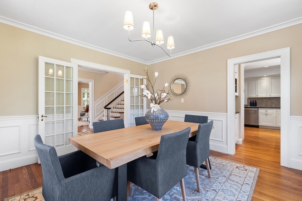209 Waltham Street Lexington, MA 02421 - Photo 6 of 39 a view of a dining room with furniture and wooden floor