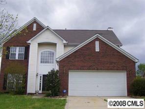 2301 Pimpernel Road Charlotte, NC 28213 - Photo 1 of 6 a front view of a house with a yard