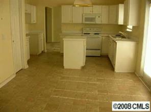 2301 Pimpernel Road Charlotte, NC 28213 - Photo 3 of 6 a utility room with a sink