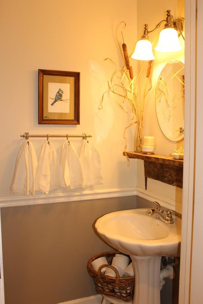 375 Old Cabaniss Road Forsyth, GA 31029 - Photo 15 of 23 a bathroom with a sink mirror and toilet