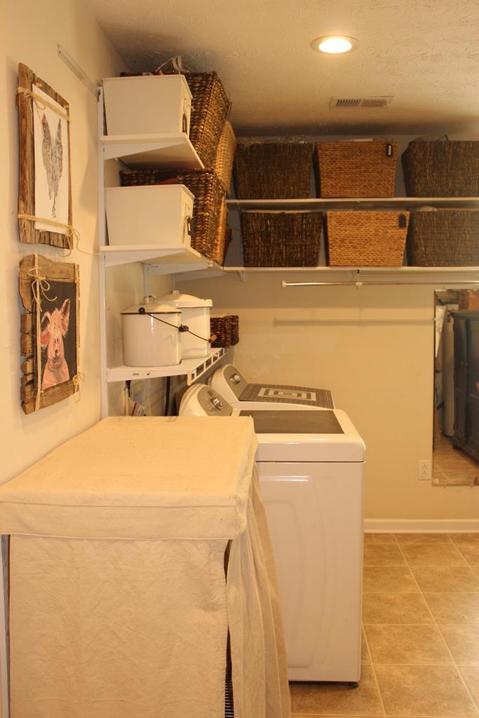 375 Old Cabaniss Road Forsyth, GA 31029 - Photo 17 of 23 a utility room with dryer and washer
