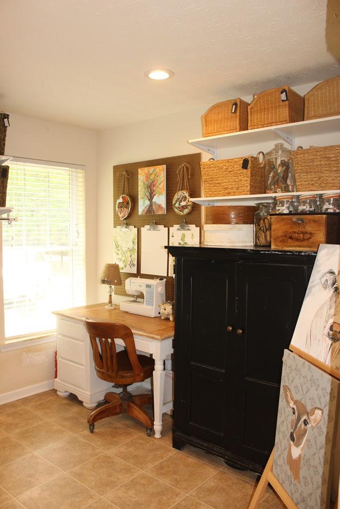 375 Old Cabaniss Road Forsyth, GA 31029 - Photo 18 of 23 a view of a workspace and a window