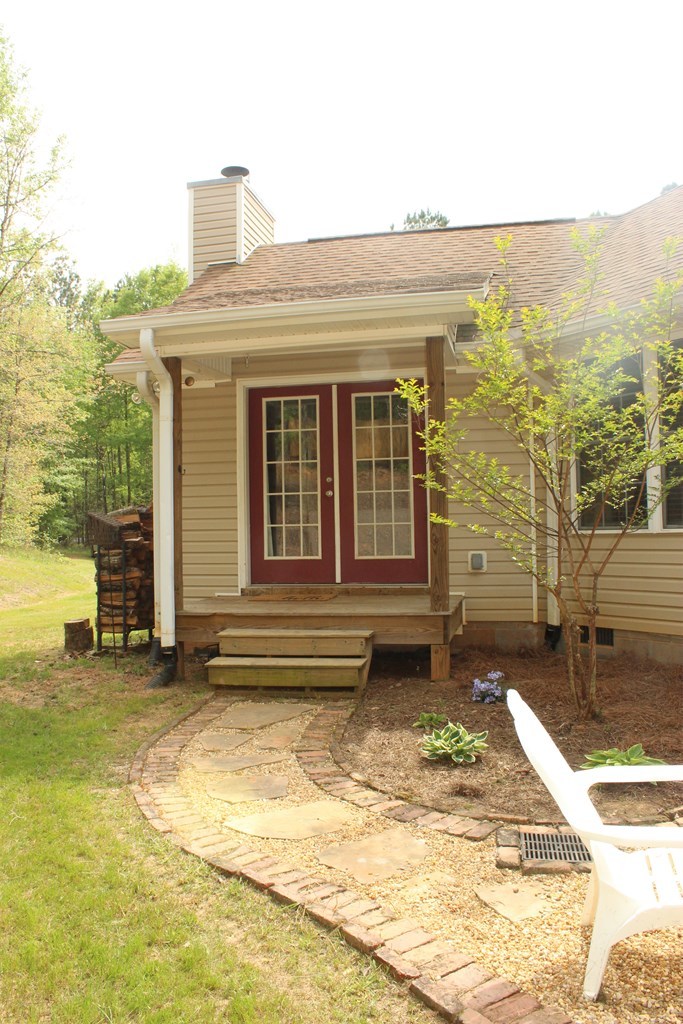 375 Old Cabaniss Road Forsyth, GA 31029 - Photo 19 of 23 a view of a house with many windows
