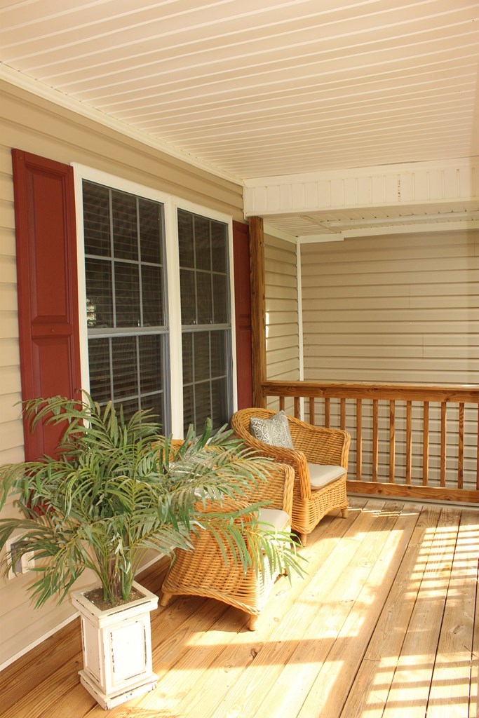375 Old Cabaniss Road Forsyth, GA 31029 - Photo 21 of 23 a view of a balcony with a lounge chair