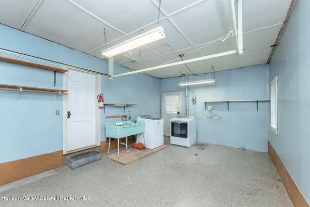 a view of utility room and utility room