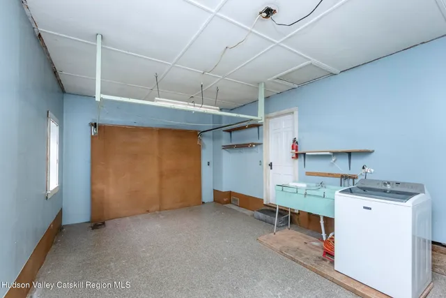 a room with storage and utility