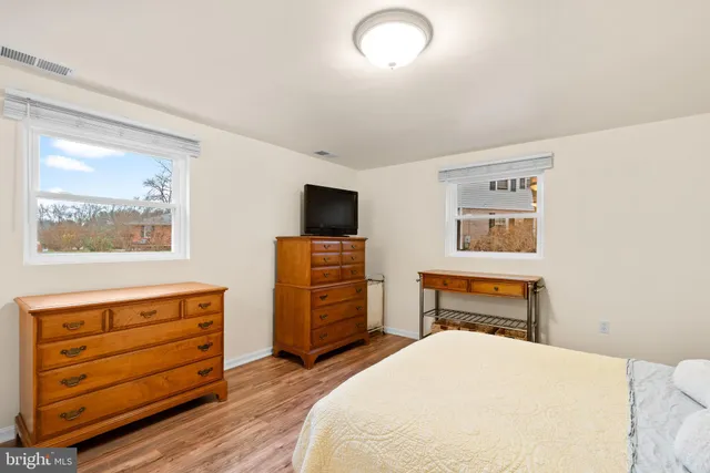 a bedroom with a bed and furniture