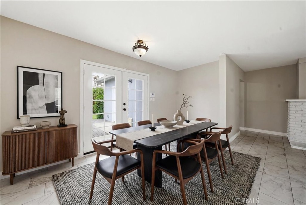 6481 Dos Rios Road Downey, CA 90240 - Photo 4 of 27 a view of a dining room with furniture