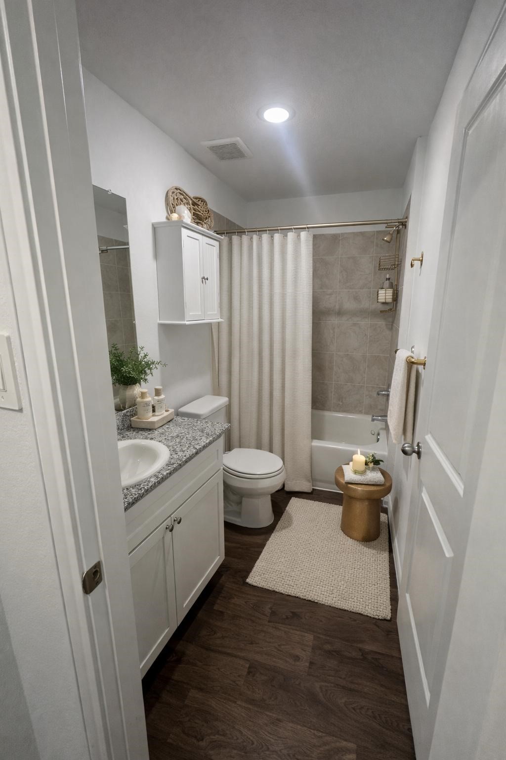 16367 Jasmine Marie Place Conroe, TX 77306 - Photo 8 of 11 a bathroom with a granite countertop sink toilet and shower