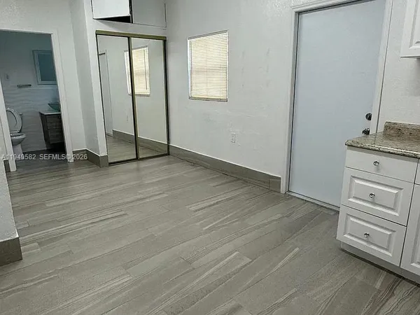 an empty room with a window