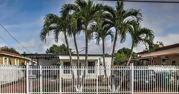 a kitchen with stainless steel appliances granite countertop a refrigerator a stove a sink and a microwave