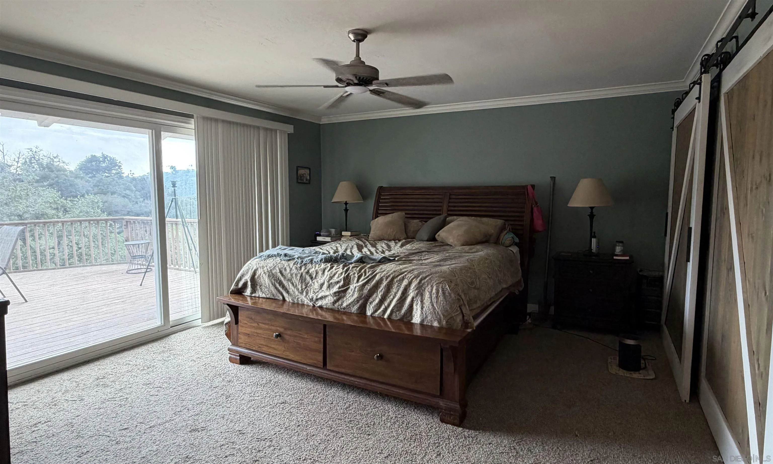 2416 Gird Road Fallbrook, CA 92028 - Photo 12 of 17 a bedroom with a bed and a large window