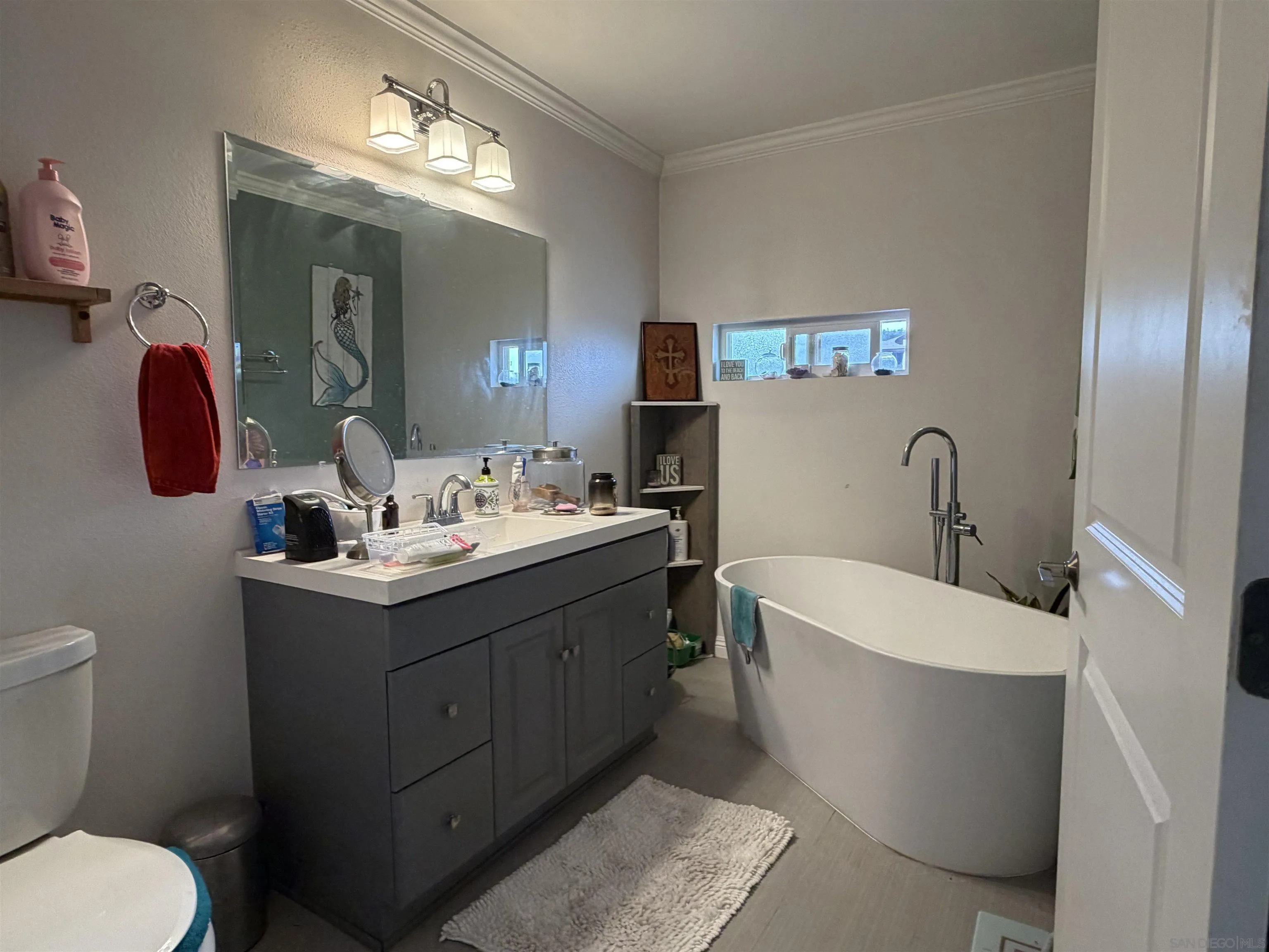 2416 Gird Road Fallbrook, CA 92028 - Photo 14 of 17 a bathroom with a double vanity sink mirror and toilet