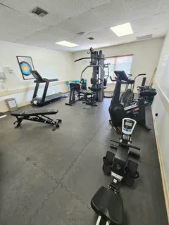 a view of a room with gym equipment