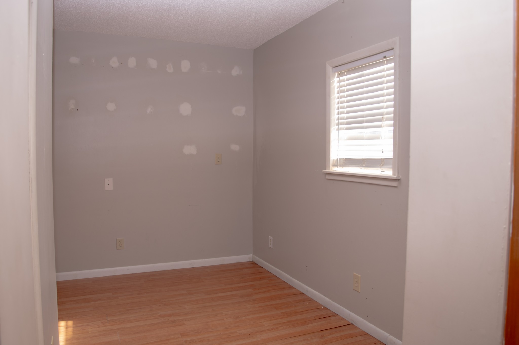 340 Jeff Road Northwest Huntsville, AL 35806 - Photo 9 of 18 an empty room with a window