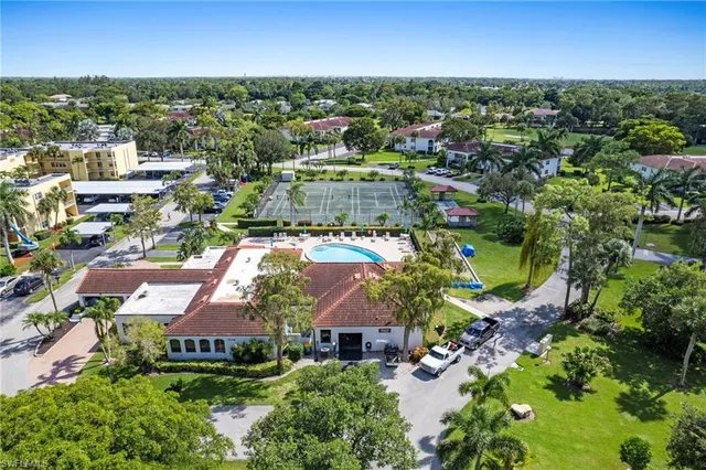 a view of a city and swimming pool