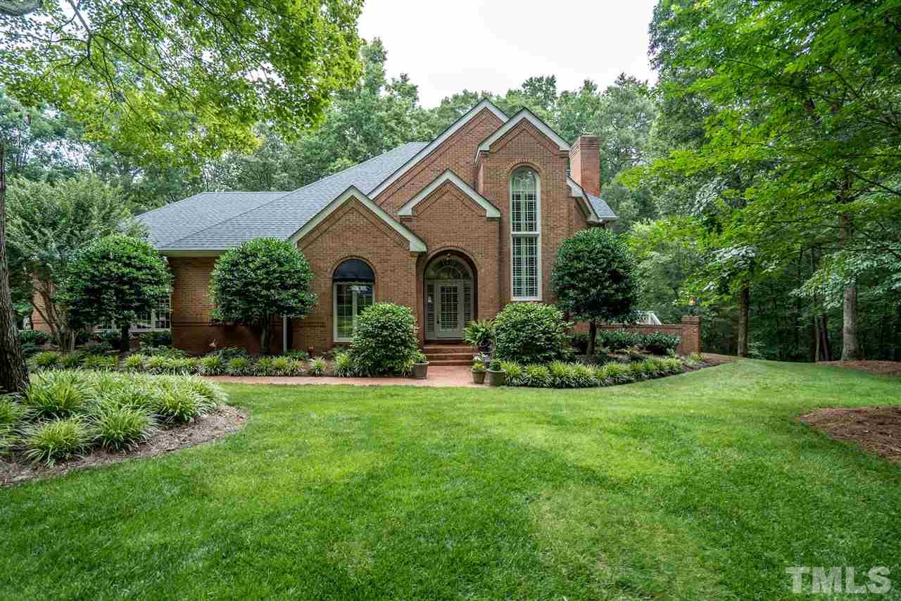 9904 Mathias Court Raleigh, NC 27615 - Photo 2 of 25 a front view of a house with a yard