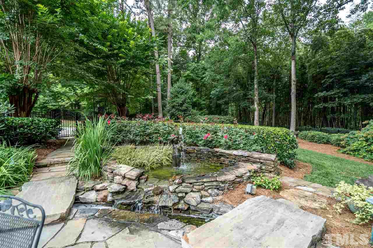 9904 Mathias Court Raleigh, NC 27615 - Photo 23 of 25 a garden with lots of trees
