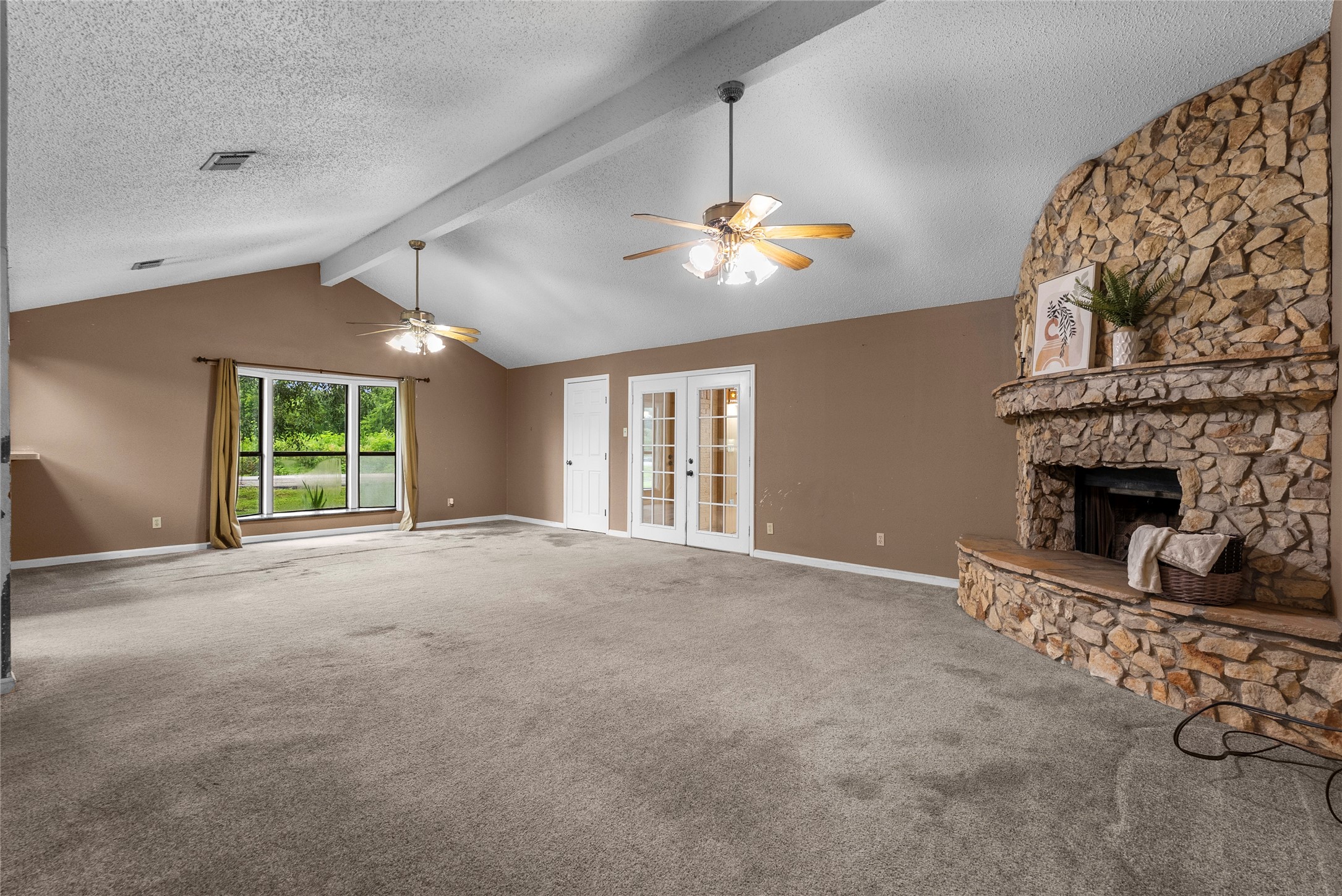 422 Rice Avenue Arcola, TX 77583 - Photo 3 of 33 Perfect for large family gatherings with a spacious living area centered around a beautiful fireplace.