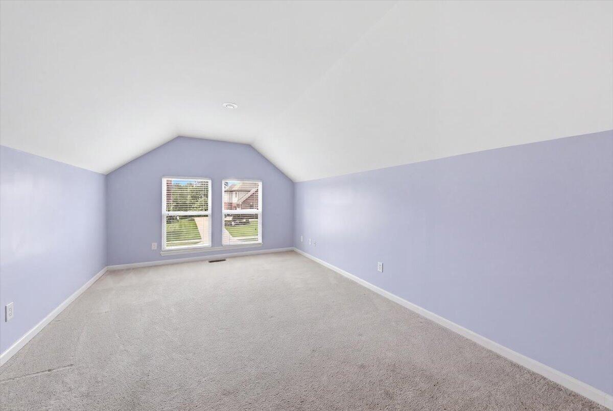 796 Rudolph Way Erlanger, KY 41018 - Photo 37 of 49 796 Rudolph Way, Erlanger KY 41018-Carpeted room featuring a vaulted ceiling, recessed lighting, and two windows with blinds