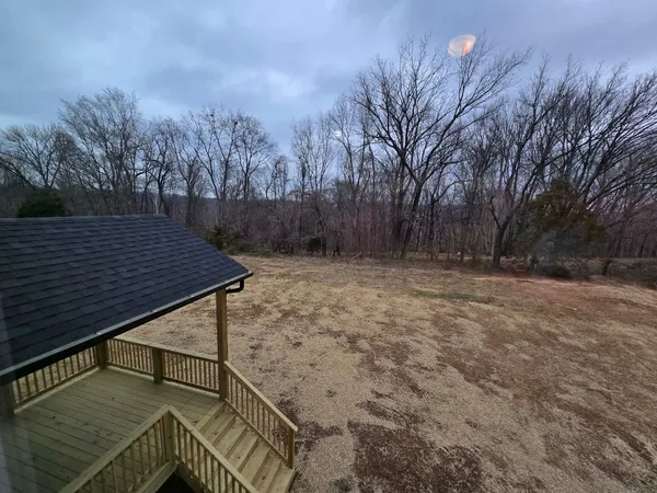 a view of wooden roof deck