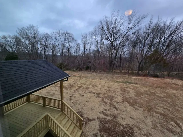 a view of wooden roof deck