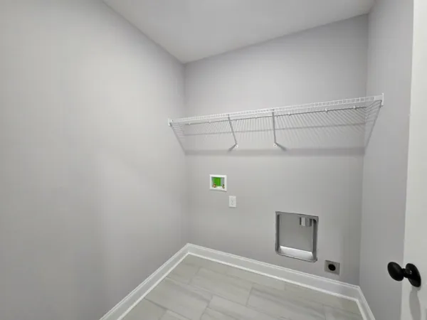 a view of a room with racks on the wall