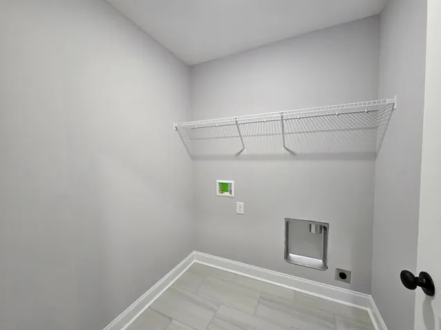 a view of a room with racks on the wall