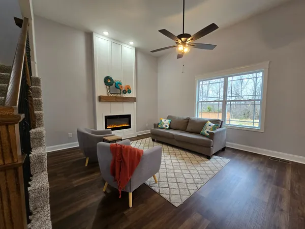 a living room with furniture and a window