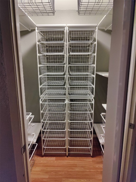 2500 Burleson Road, Unit 315 Austin, TX 78741 - Photo 10 of 21 Custom walk-in closet with extensive shelving and storage drawers