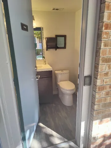 a bathroom with a toilet and a sink