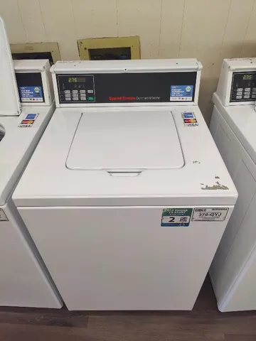 a utility room with washer and dryer