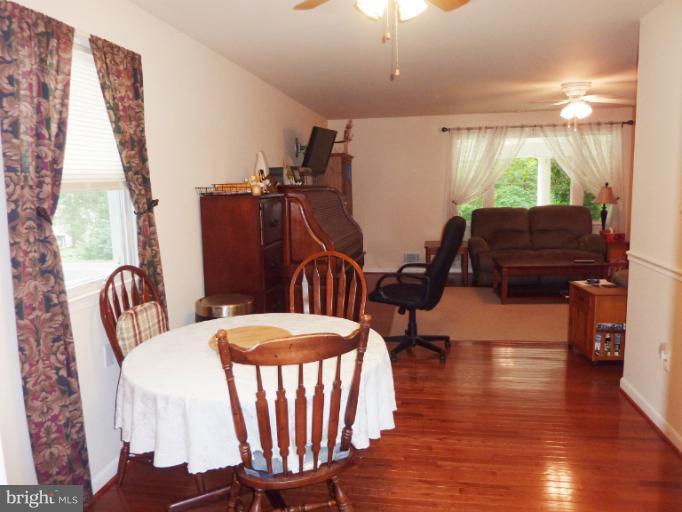 12723 Kahns Road Manassas, VA 20112 - Photo 8 of 30 Dining Room on Main Level with Hardwood Floors