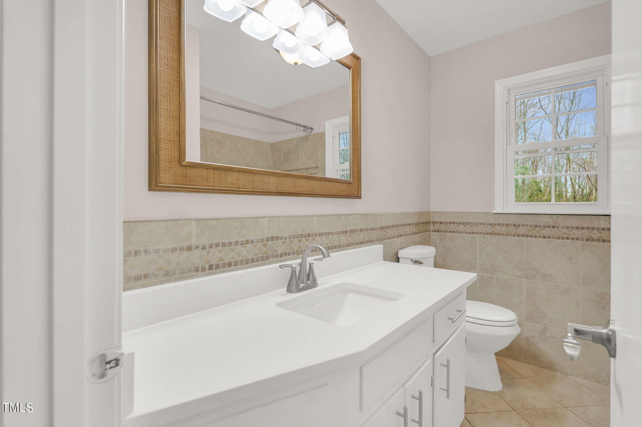 1073 Brick Mill Road Coats, NC 27521 - Photo 21 of 32 a bathroom with a sink and a toilet