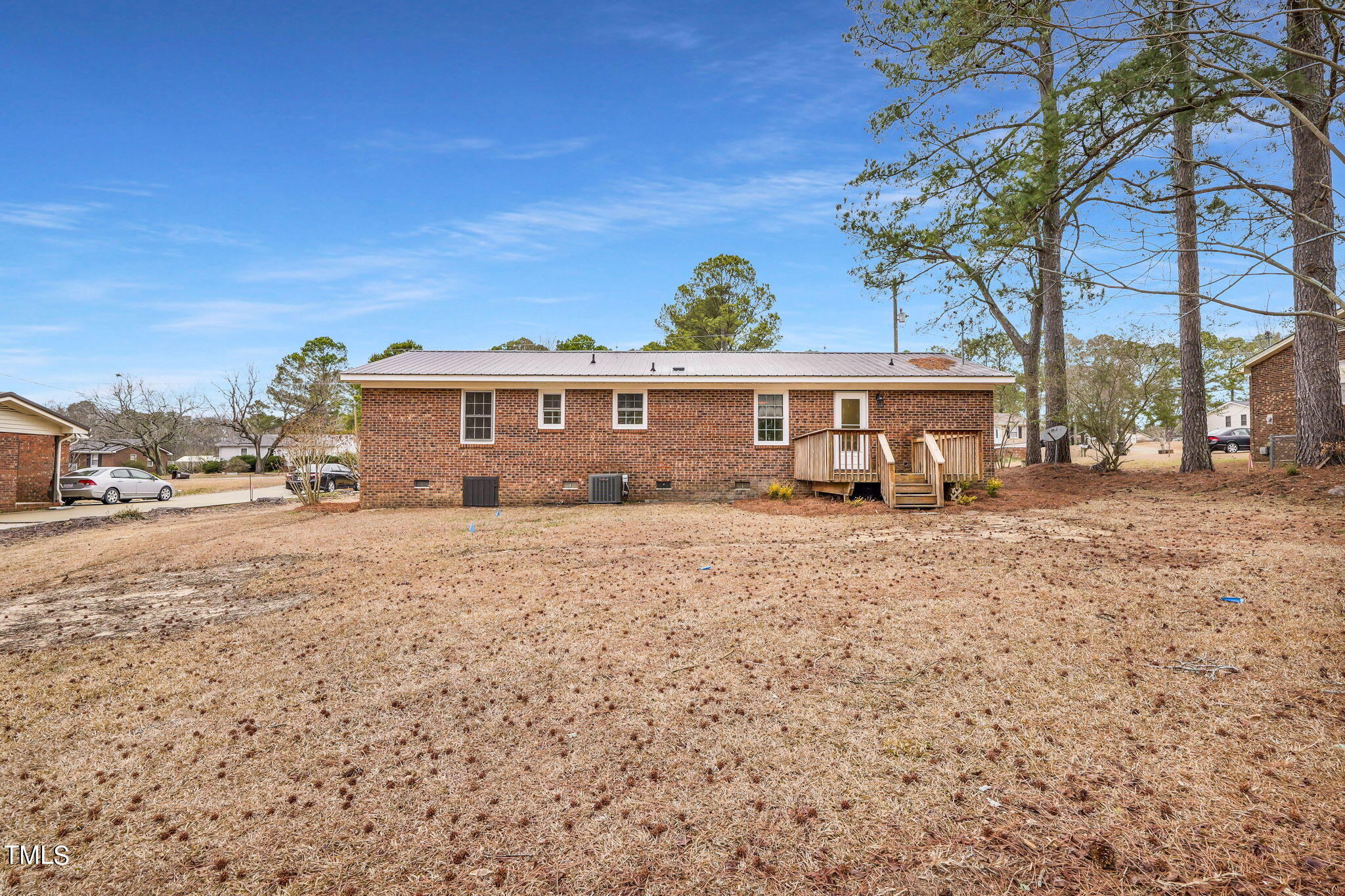 1073 Brick Mill Road Coats, NC 27521 - Photo 26 of 32 a view of a house with a yard