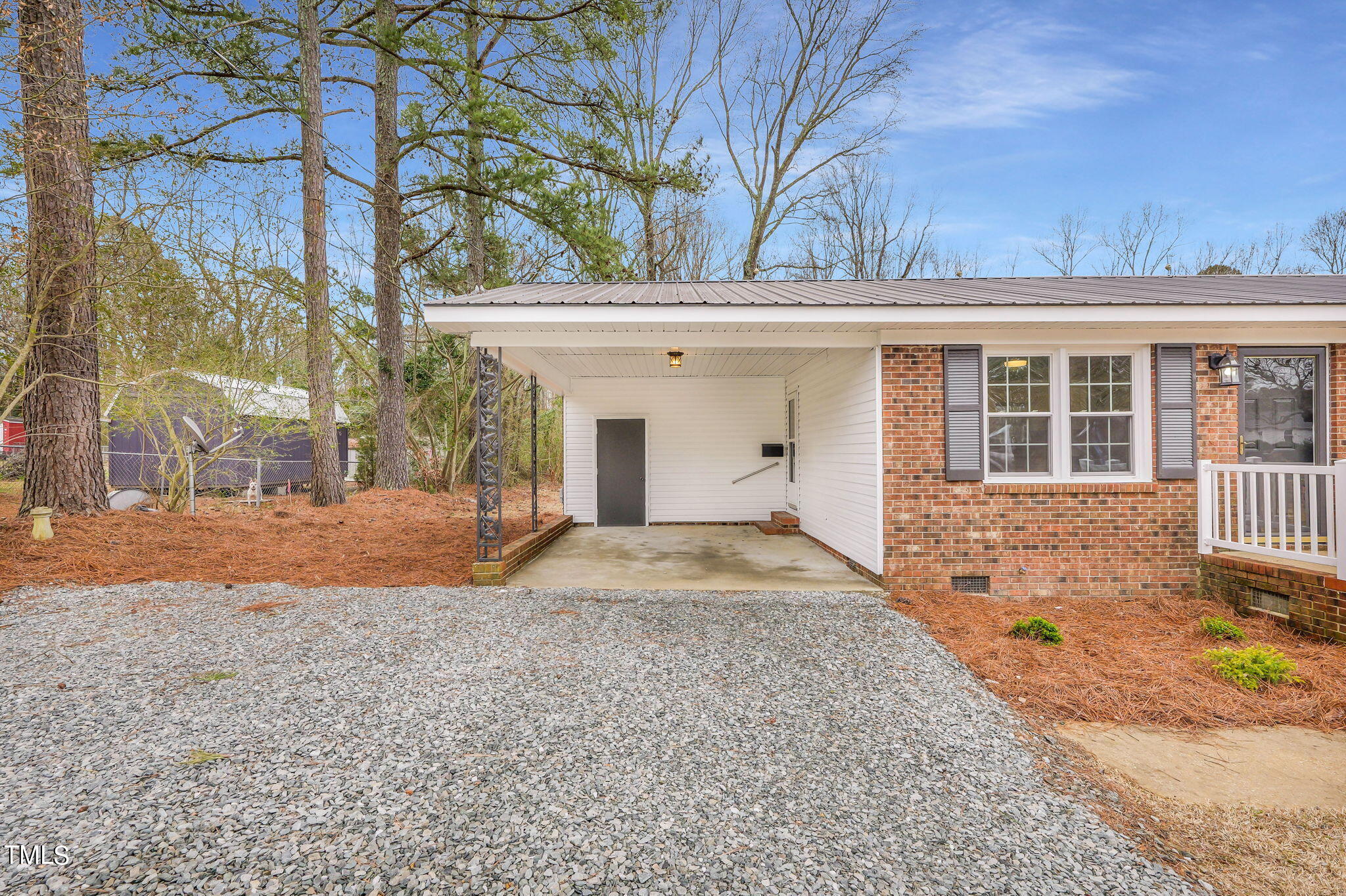 1073 Brick Mill Road Coats, NC 27521 - Photo 5 of 32 a view of a house with a yard and covered with snow