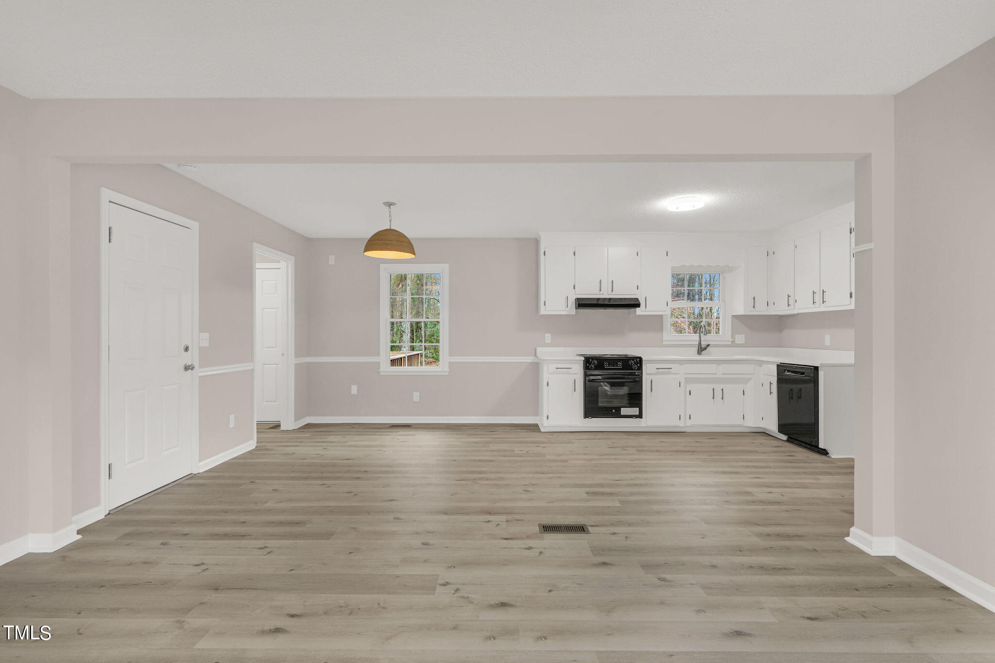 1073 Brick Mill Road Coats, NC 27521 - Photo 10 of 32 a view of a kitchen with a sink cabinets and a fireplace