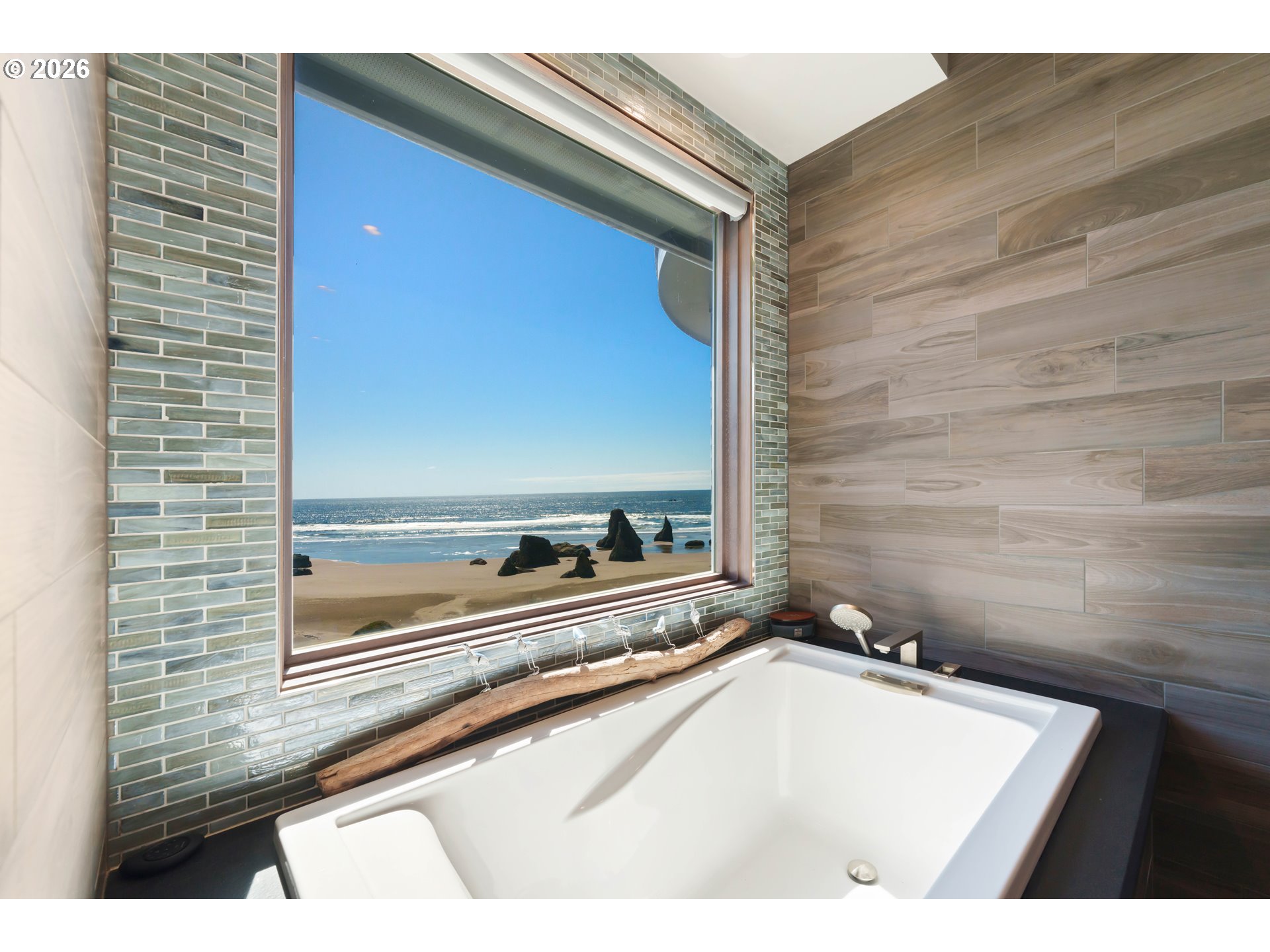 2488 Beach Loop Road Bandon, OR 97411 - Photo 39 of 48 a picture of a bathroom with a sink and a mirror