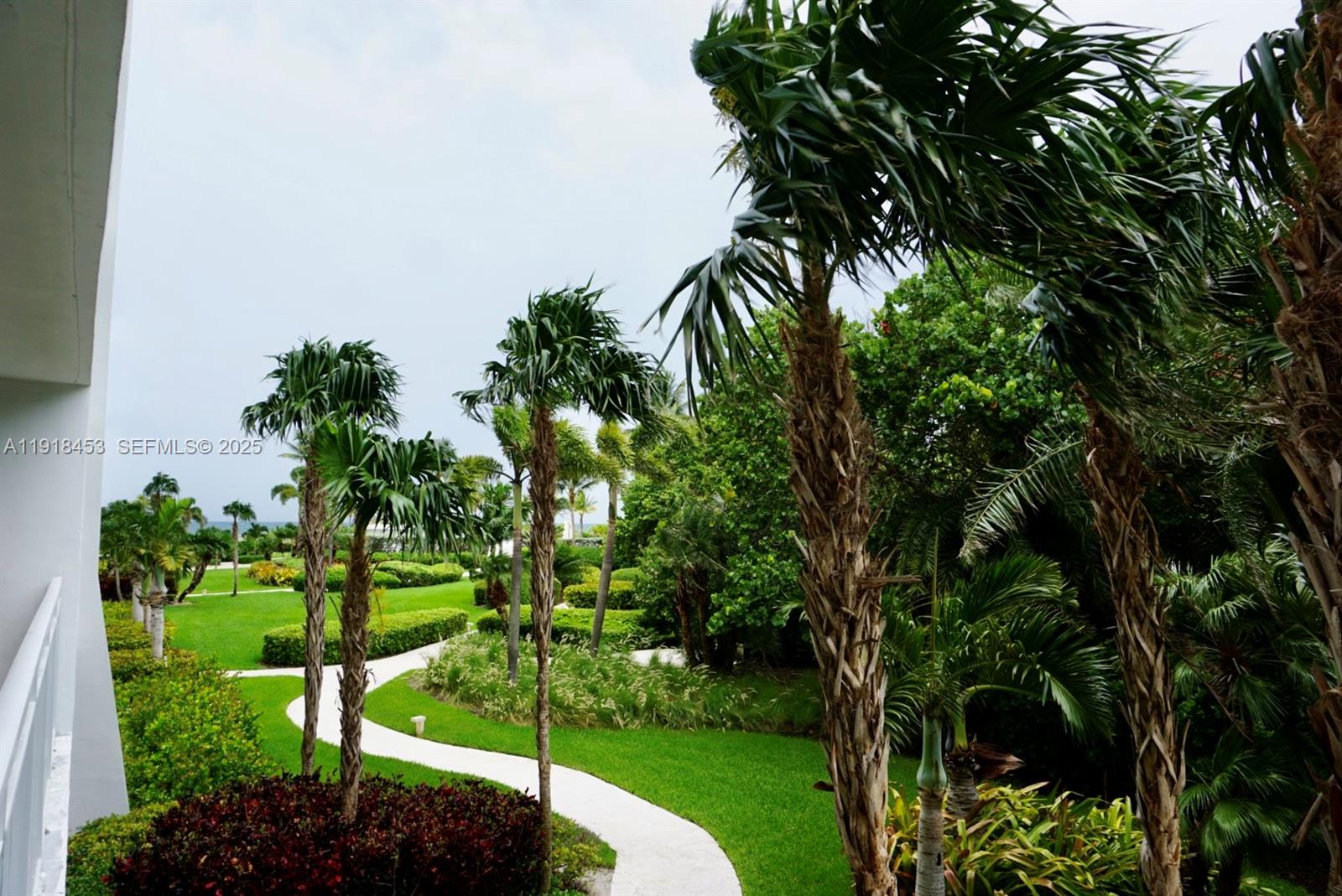 605 Ocean Drive, Unit 2L Key Biscayne, FL 33149 - Photo 37 of 46 SHORT WALKWAY TO BEACH, POOL, BBQ AREA