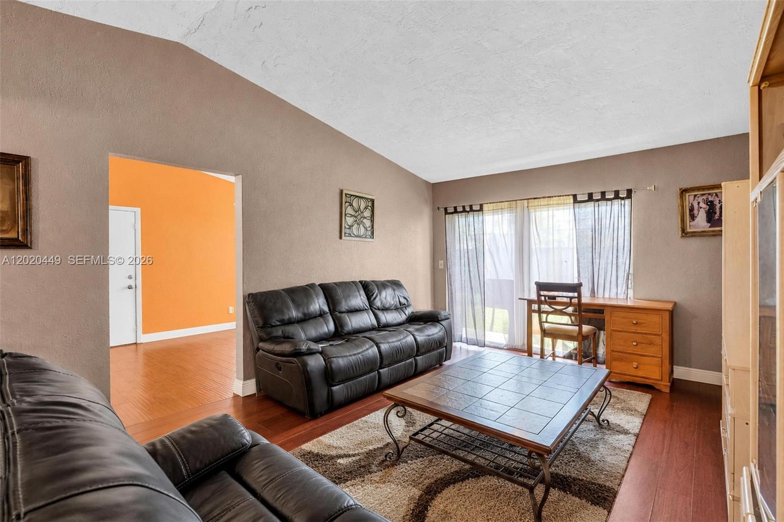 11061 Southwest 163rd Street Miami, FL 33157 - Photo 11 of 42 a living room with furniture and a window