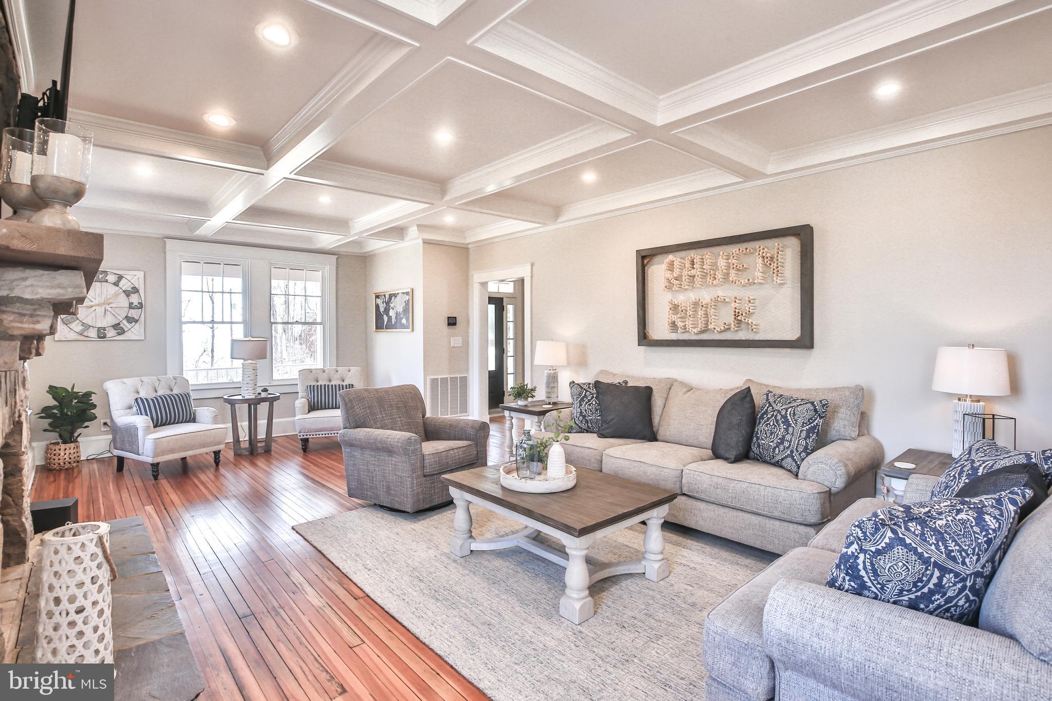 17345 Raven Rocks Road Bluemont, VA 20135 - Photo 21 of 99 a living room with furniture wooden floor and a lamp