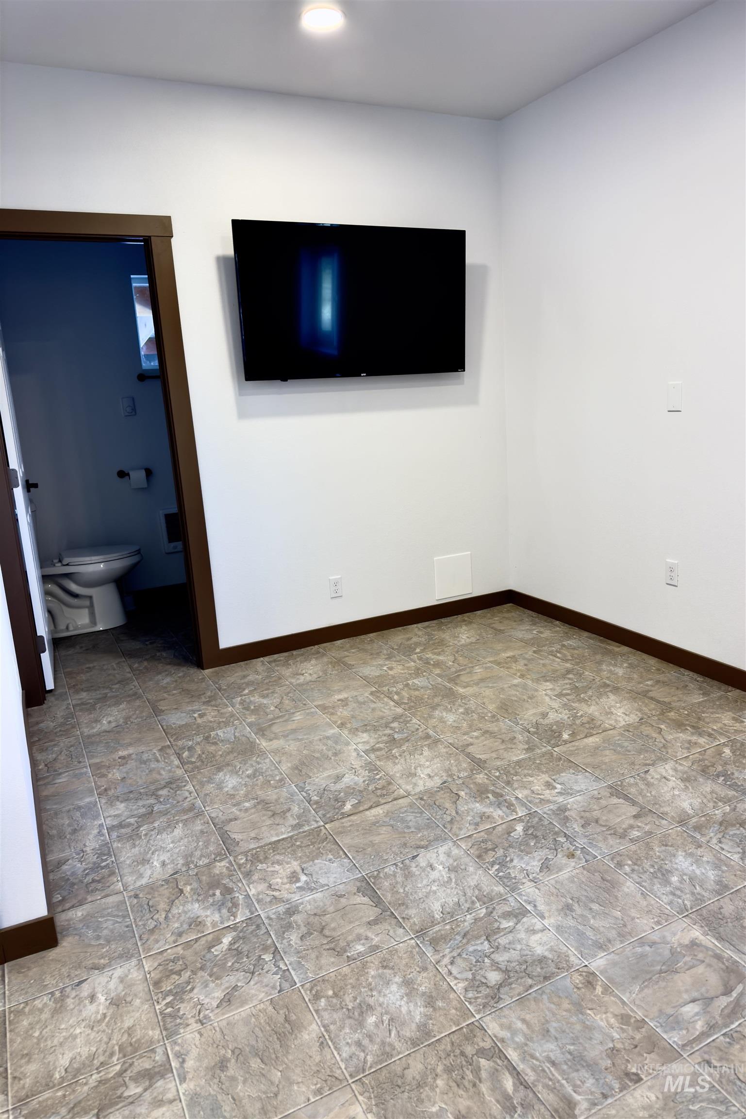 1112 Old Pk Road Deary, ID 83823 - Photo 21 of 23 Unfurnished room with stone finish floors