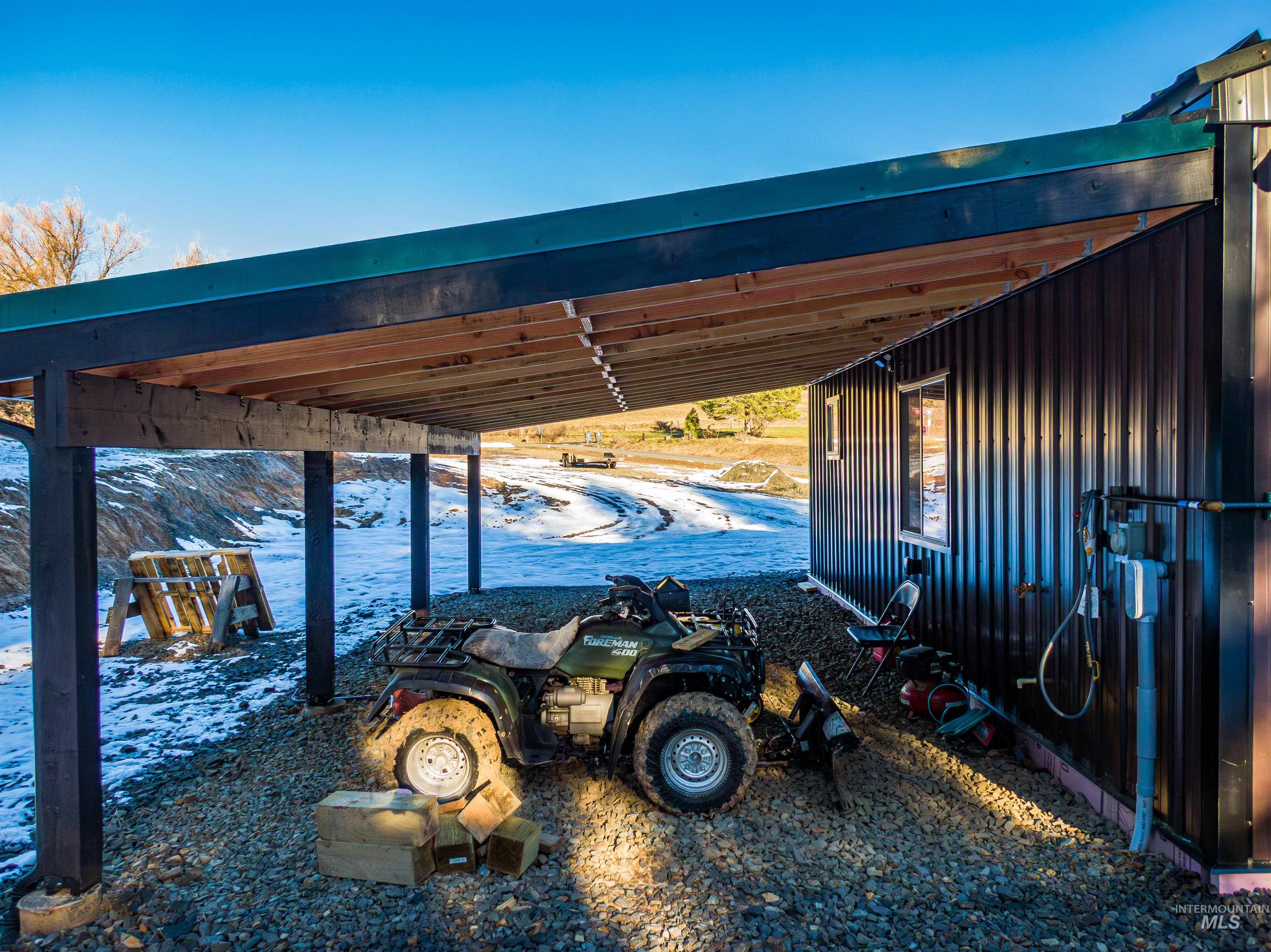 1112 Old Pk Road Deary, ID 83823 - Photo 8 of 23 View of yard with an attached carport